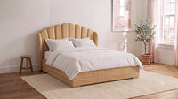 The Primrose scalloped bed in carved Natural Oak