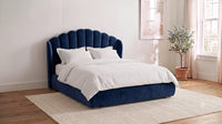 The Primrose scalloped bed in Navy Velvet